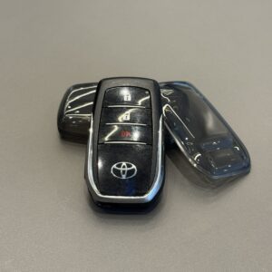 FORRO LLAVE GRIS OSCURO FORTUNER - HILUX